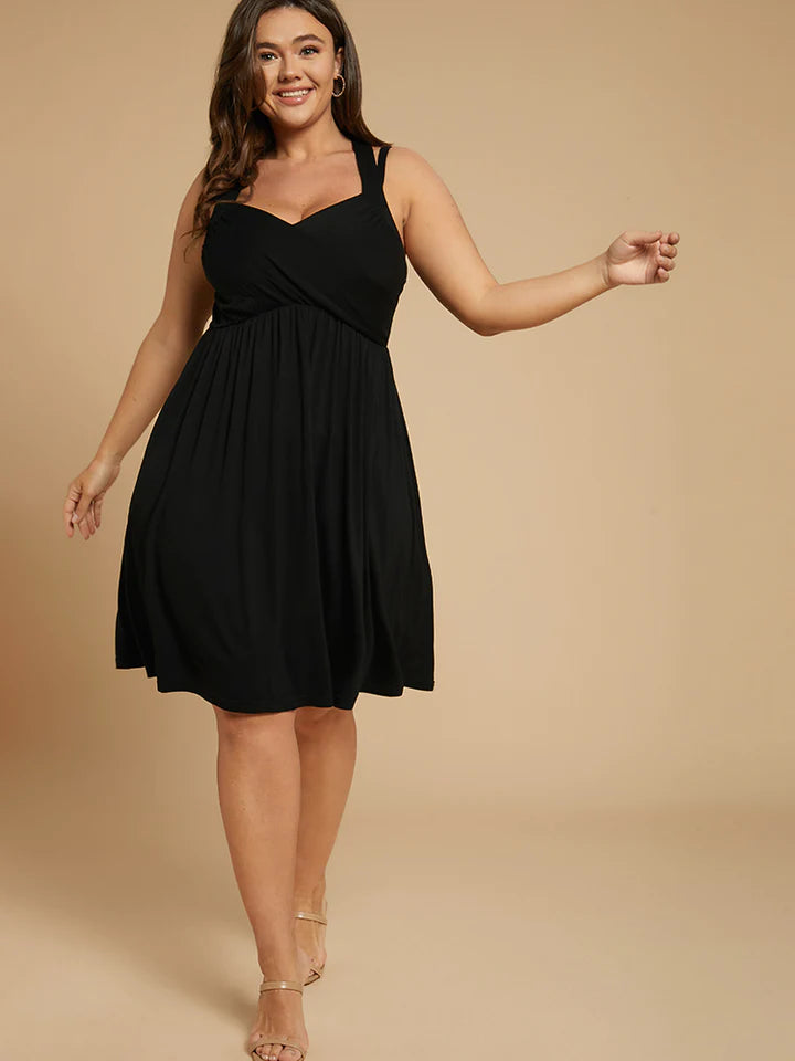 BLOOMCHIC SEXY CRISS CROSS BACK CAMI STYLE DRESS WITH FLARE BOTTOM ELASTIC WAISTMULTIPLE SIZES Tunics Sophisticated sleek